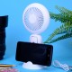 Бял ръчен вентилатор с поставка за телефон и LED осветление