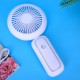 Бял ръчен вентилатор с поставка за телефон и LED осветление